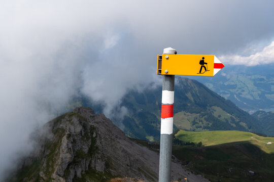 Hiking trail signage in the swiss mountains. 