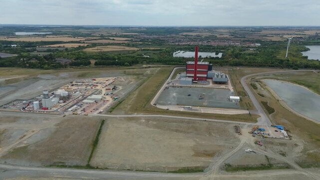 Aerial drone view of Millbrook and Rookery industrial power plant, energy generation from gas and oil, smoke stacks, Bedford England UK