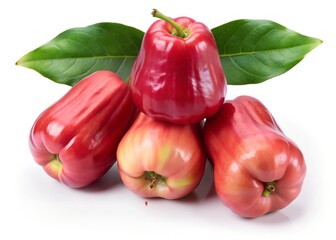 A cluster of ripe red rose apples with green leaves, isolated on a white background