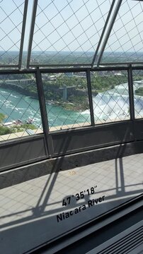 SLOW MOTION The American Falls and Bridal Veil Falls, the U.S. Customs and Border Protection &ndash; Rainbow Bridge Port of Entry, and the Prospect Point Observation Tower in Niagara Falls, Ontario, Canada.