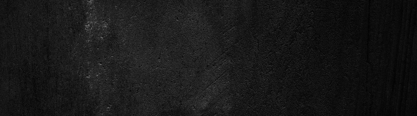 Dark, grungy textured background resembling an old blackboard, perfect for adding a vintage and edgy feel to design projects.