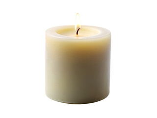 A single lit pillar candle glows softly against a stark black background creating a warm and inviting atmosphere