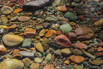 Colorful stones in shallow creek