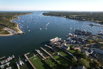 Fototapeta premium Aerial view of a bustling harbor with boats and yachts