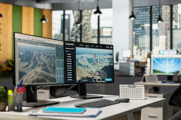 Naklejka premium PC in empty office used to research next generation wind turbine technologies, accelerating clean energy adoption. Computer in RD workspace used to optimize aerodynamic design of VAWT turbine