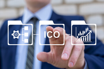 Business person using virtual touch screen presses the acronym ICO. ICO Initial Coin Offering Concept. Financial investment, cryptocurrency, blockchain, coin and digital asset.