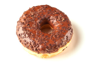 A chocolate donut with sprinkles on top. The donut is sitting on a white background. Premium high quality bakery product.