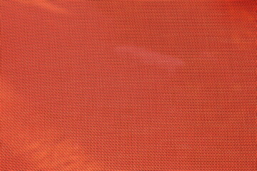 Red transparent background. Closeup at a furniture chair outside.