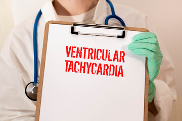 dobtor holds a card with the text Ventricular Tachycardia