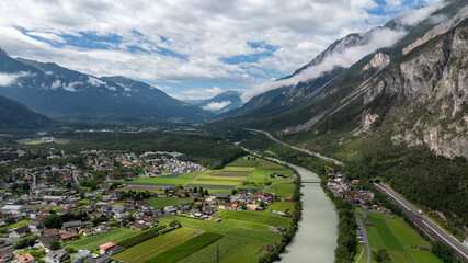 Aerial view of Haiming village and river inn in Tyrol, Austria, with the inntal autobahn - a12 - winding through the valley