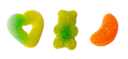 Colorful gummy candy set in bear, heart, and orange slice shapes with sugar and sour coating isolated on transparent for halloween trick or treat concept.