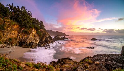 Dramatic coastal scene at sunset, featuring a rocky shoreline, a sandy beach, and a vibrant sky filled with hues of pink, purple, and blue.