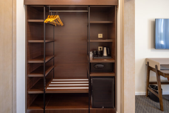 Hotel wardrobe with a safe and a mini fridge