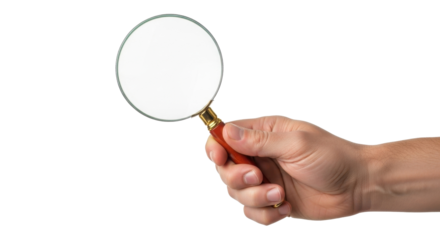 Hand holding a magnifying glass against a white background, focusing on the lens.