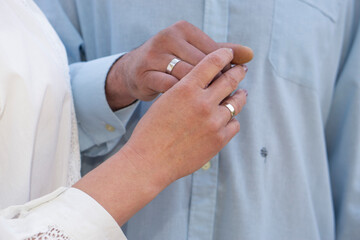 hands of the groom and bride