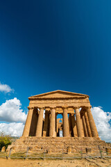 Ancient Greek Temple Ruins in Sicily, Italy Under a Clear Blue Sky