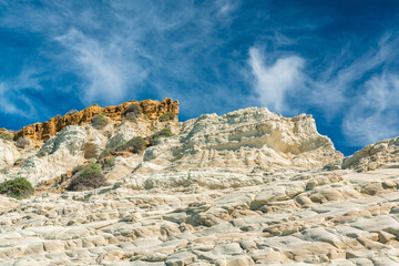 Stunning Rocky Cliffs Against Vibrant Sky in Sicily, Italy