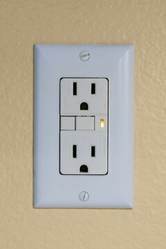 Close up of a tripped GFCI modern electrical outlet