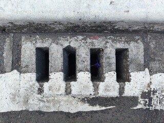 Drainage hole for water access on the highway 