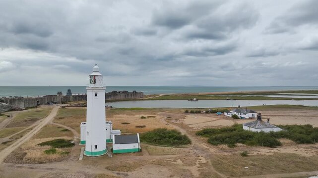 Hurst Point Lighthouse and Hurst Castle from drone over Hurst Spit, Milford on Sea, Lymington, Hampshire, England