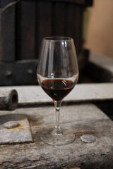 Tasting of Banyuls AOC aged natural sweet grand cru Banyuls fortified dessert wine from old vines from slopes Pyrenees in Roussillon, France made in glass jar Dame Jeanne or demijohn