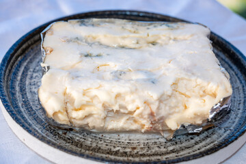 Italian food, buttery or firm blue cheese made from cow milk in Gorgonzola, Milan, Italy close up