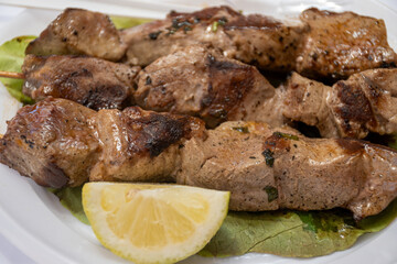 Catch of the day, tuna fish grilled on skewers on daily fish market in Marsala, Sicily, tasty street food in Italy