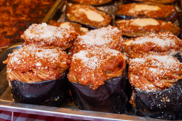 Delicious fresh cooked street food on daily food market in Palermo, Sicily, travel destination, food tourism Italy, variety of roasted, grilled fish, seafood, meat, vegetables served snacks, dish