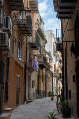 View of streets of Palermo, citylife, ancient baroque churches, old narrow streets, Norman palaces, markets, Sicilian vacation destination, South of Italy