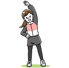 スポーツウェアで体操する若い女性