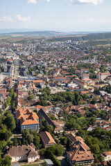 Explore the charming architecture and lush greenery of this historic city nestled in the heart of Transylvania. A vibrant mix of old and new, perfect for showcasing European urban life