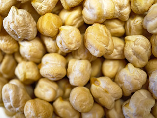 A pile of roasted yellow chickpeas also known as leblebi in Turkey this close-up photograph captures the texture and details of the popular and healthy savory snack