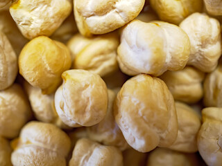 A close-up image showing a heap of roasted yellow chickpeas a traditional Turkish snack called leblebi the photo highlights the savory and healthy nature of this legume