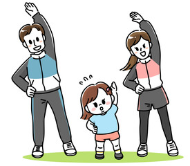 笑顔で体操する家族