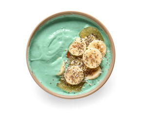 Bowl of tasty spirulina smoothie with banana and kiwi on white background