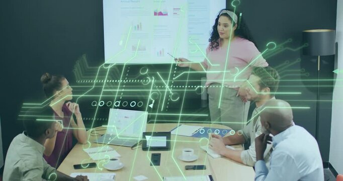 Presenter raising laser pointer and explaining business chart as green overlay animating circuit