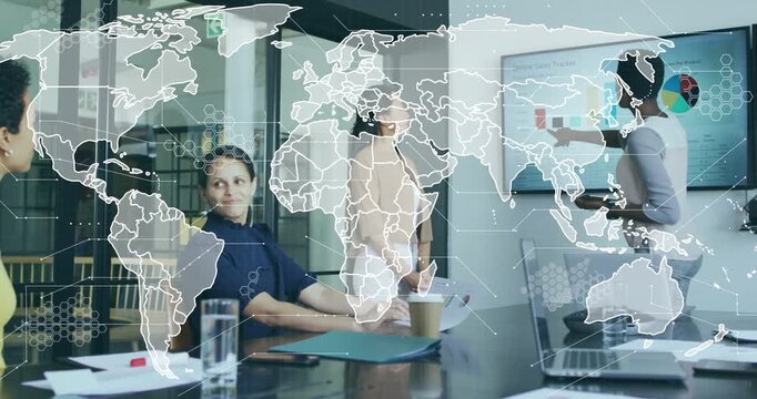 Presenter displaying charts and sparking world map overlay with colleagues tracking sales forecast