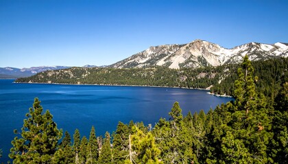 Obraz premium Alpine Lake Serenity: Emerald Bay's Majestic Mountains and Blue Waterscape