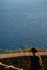 Vibrant photos of Cinque Terre featuring Italian beaches, boats on the Mediterranean, bikini lifestyle, coastal towns, colorful villages, and summer vacations