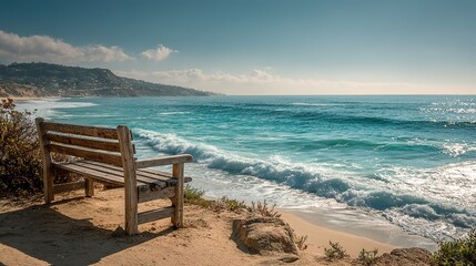 Bench with Blue Sky and Beach. Ocean View in the Background. Relaxing Coastal Scene.