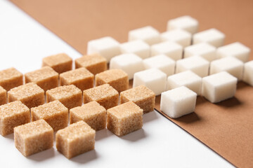 Many different sugar cubes on color background