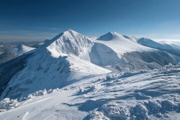 Obraz premium Snowy winter peaks of the Western Carpathians in Slovakia on a sunny day