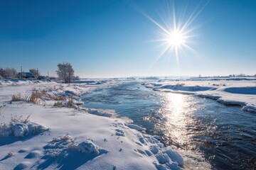 Radiant sun above the wintry river beneath a blue sky the icy river blanketed in smooth white snow