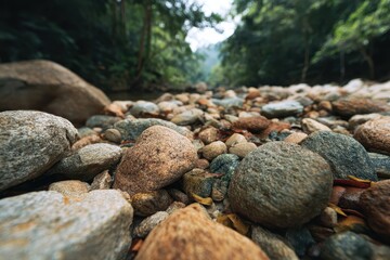 Fototapeta premium Close up of a natural stone near a river in a Thai mountain forest highlighting ecology