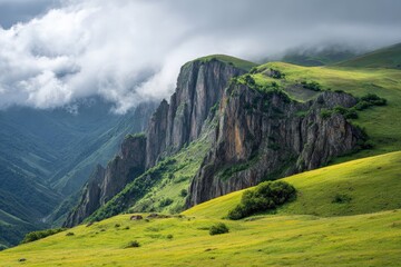 Scenic mountains with grassy fields under the sky Unpopulated cliffs in a panoramic view Wildlife amid hills and clouds