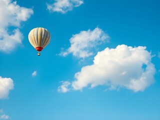 Fototapeta premium Colorful Hot Air Balloon under Bright Summer Clouds