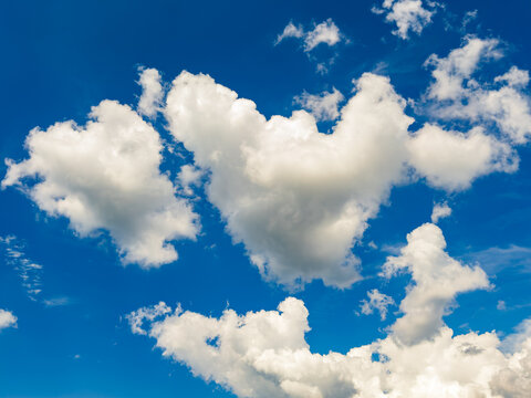 Heart shaped cloud in the blue sky