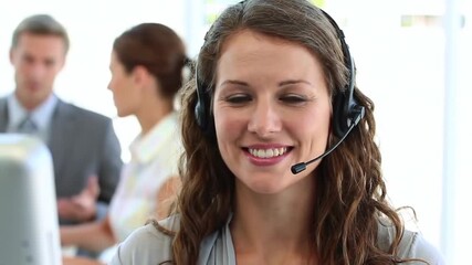 Cheerful Woman with Headset Providing Customer Service in Bright Corporate Office - Powered by Adobe