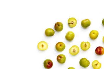 Fresh green plum fruit on white background.