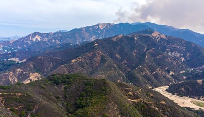 Fototapeta premium Panoramic vistas of the Santa Monica mountains shrouded in an ethereal hazy atmosphere with